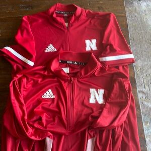 2 Nebraska Huskers light weight shirts.